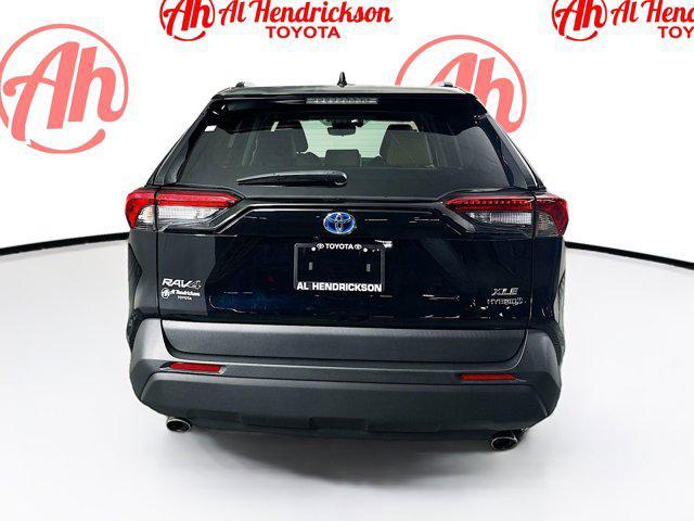 used 2024 Toyota RAV4 Hybrid car, priced at $33,377