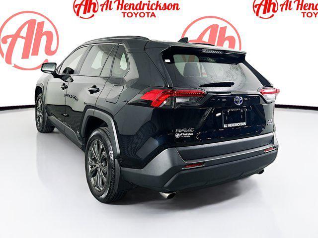 used 2024 Toyota RAV4 Hybrid car, priced at $33,377