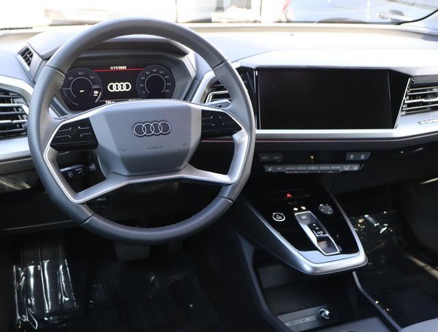 used 2024 Audi Q4 e-tron Sportback car, priced at $47,988