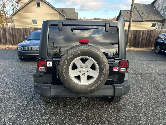 used 2016 Jeep Wrangler Unlimited car, priced at $22,555