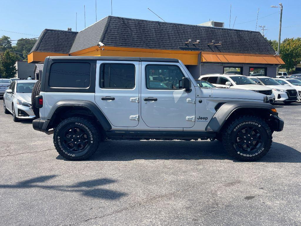 used 2023 Jeep Wrangler 4xe car, priced at $31,999