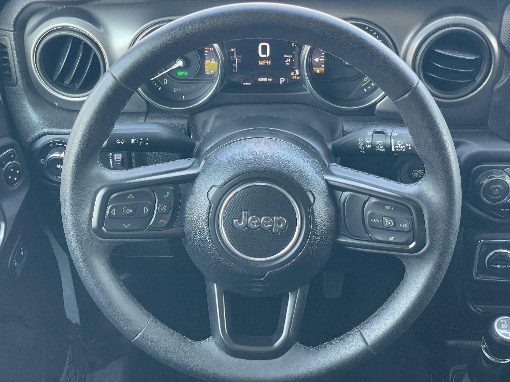 used 2023 Jeep Wrangler 4xe car, priced at $31,999