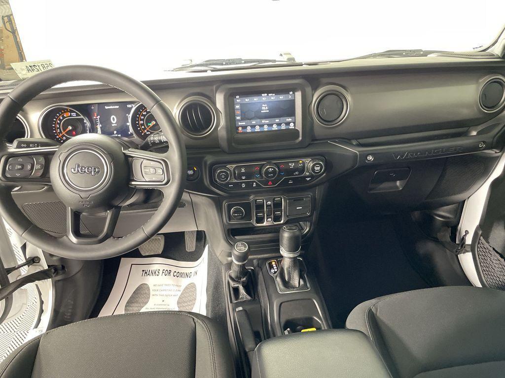 used 2023 Jeep Wrangler car, priced at $34,622