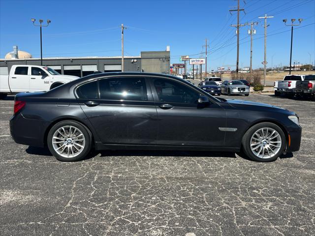 used 2015 BMW 750 car, priced at $19,991