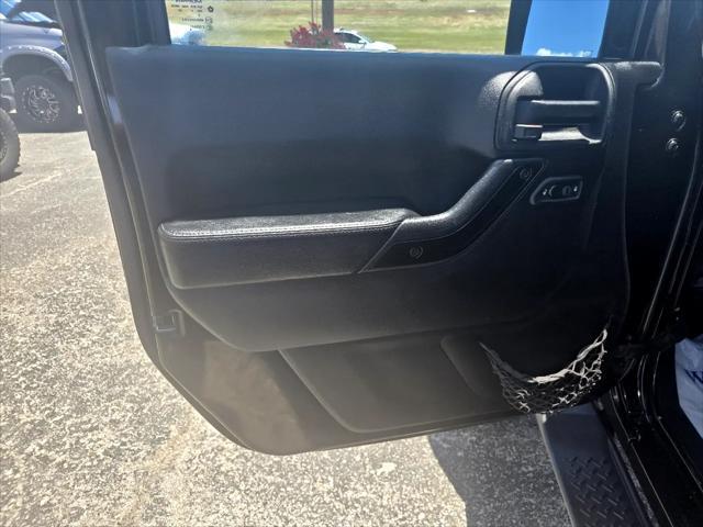 used 2014 Jeep Wrangler Unlimited car, priced at $24,991