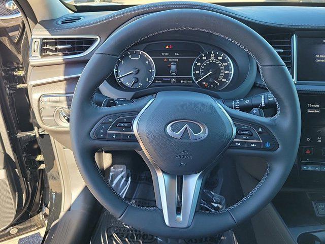 used 2025 INFINITI QX50 car, priced at $44,585