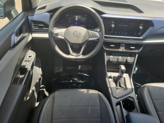 used 2022 Volkswagen Taos car, priced at $16,875
