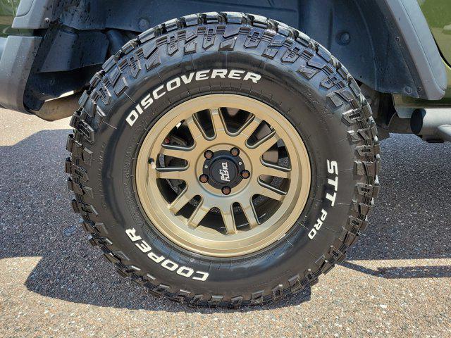 used 2021 Jeep Wrangler Unlimited car, priced at $33,098