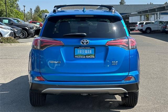 used 2018 Toyota RAV4 car, priced at $19,293