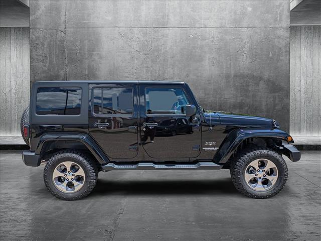 used 2016 Jeep Wrangler Unlimited car, priced at $27,891