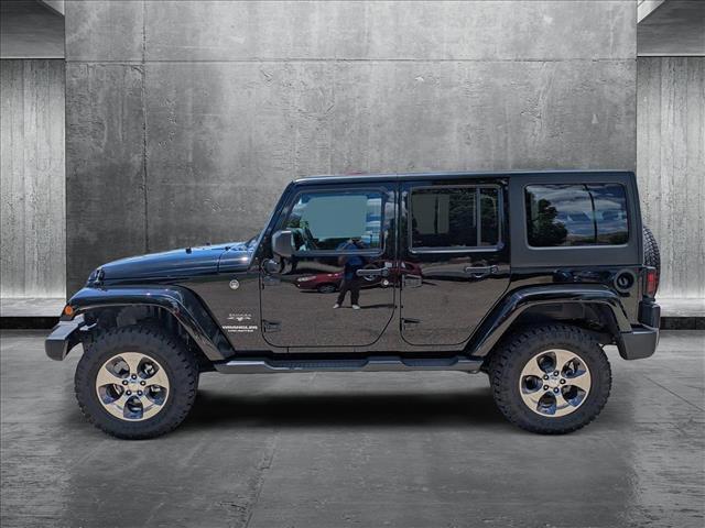 used 2016 Jeep Wrangler Unlimited car, priced at $27,891
