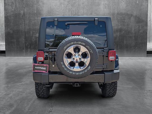 used 2016 Jeep Wrangler Unlimited car, priced at $27,891