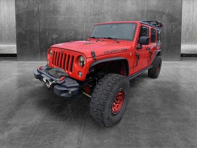 used 2016 Jeep Wrangler Unlimited car, priced at $30,097