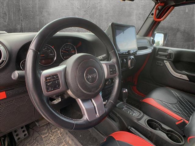 used 2016 Jeep Wrangler Unlimited car, priced at $30,097