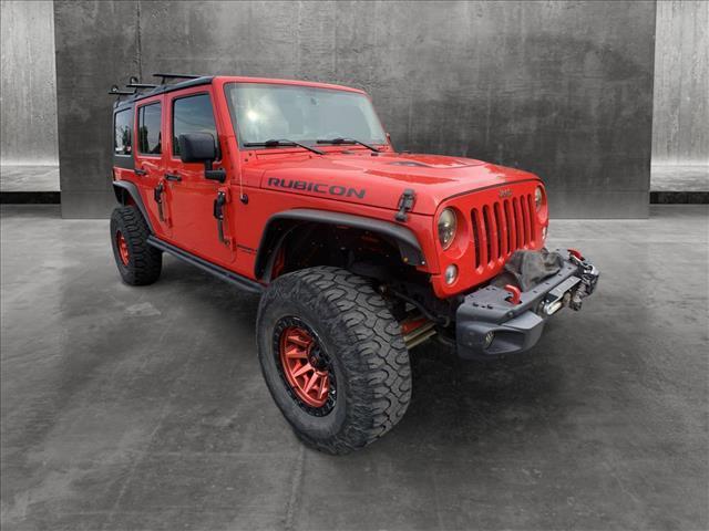 used 2016 Jeep Wrangler Unlimited car, priced at $30,097