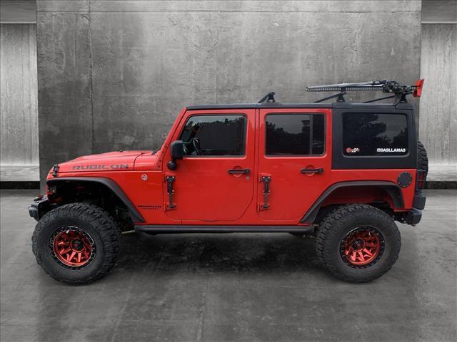 used 2016 Jeep Wrangler Unlimited car, priced at $30,097