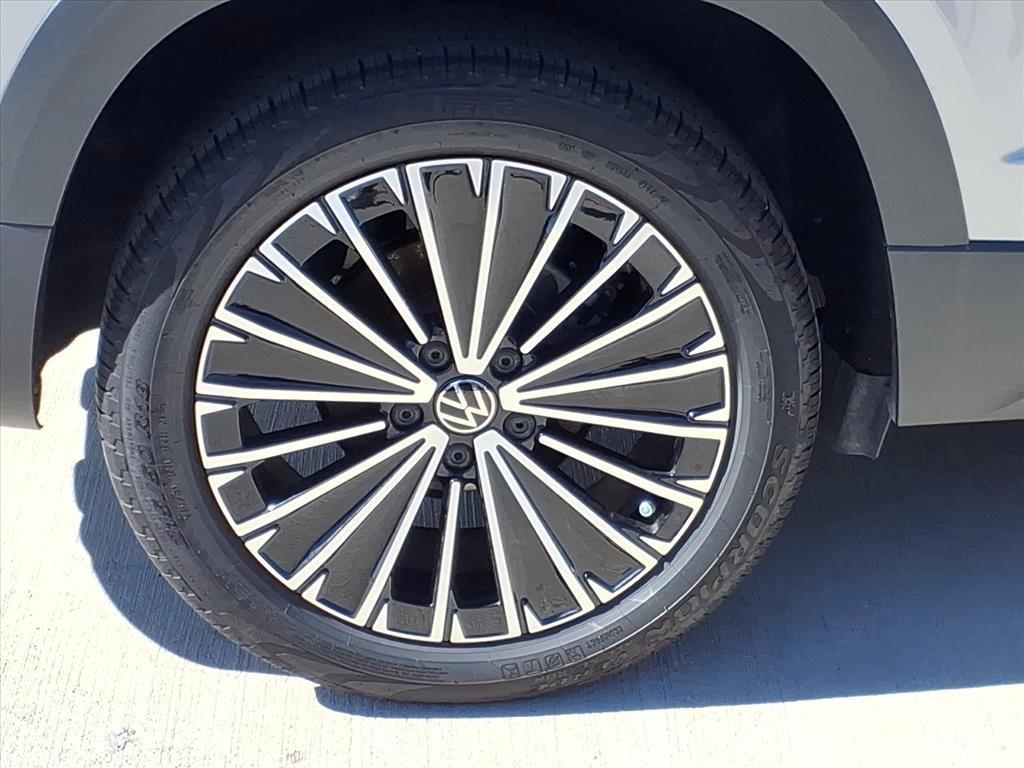 used 2025 Volkswagen Taos car, priced at $22,699