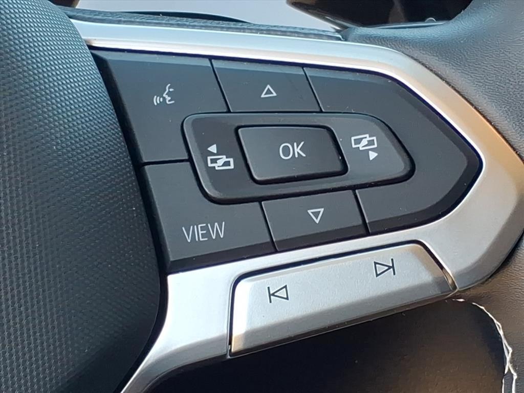 used 2023 Volkswagen Taos car, priced at $15,299