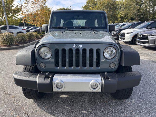 used 2014 Jeep Wrangler Unlimited car, priced at $14,743