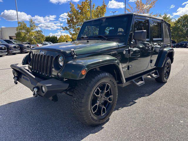 used 2011 Jeep Wrangler Unlimited car, priced at $11,857