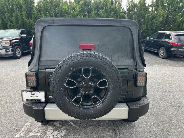 used 2011 Jeep Wrangler Unlimited car, priced at $11,447
