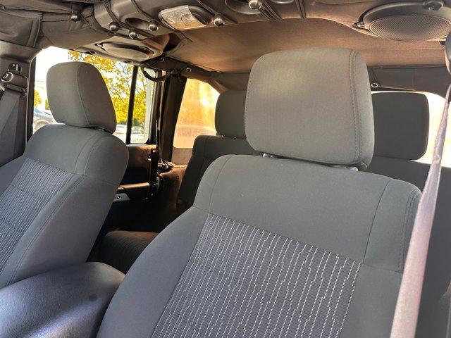 used 2011 Jeep Wrangler Unlimited car, priced at $11,857