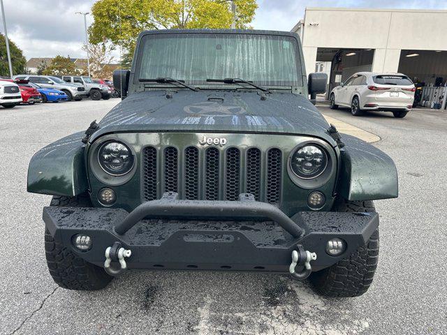 used 2011 Jeep Wrangler Unlimited car, priced at $11,447