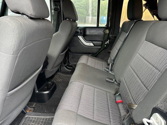 used 2011 Jeep Wrangler Unlimited car, priced at $11,447
