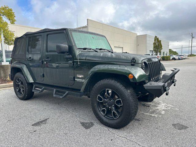 used 2011 Jeep Wrangler Unlimited car, priced at $11,447