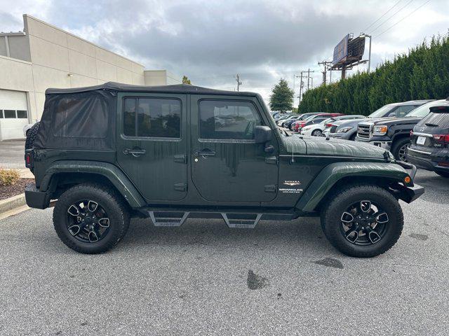 used 2011 Jeep Wrangler Unlimited car, priced at $11,447