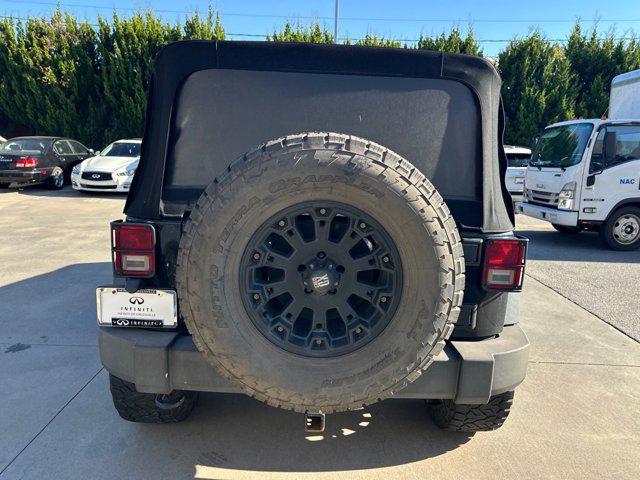 used 2014 Jeep Wrangler Unlimited car, priced at $16,999