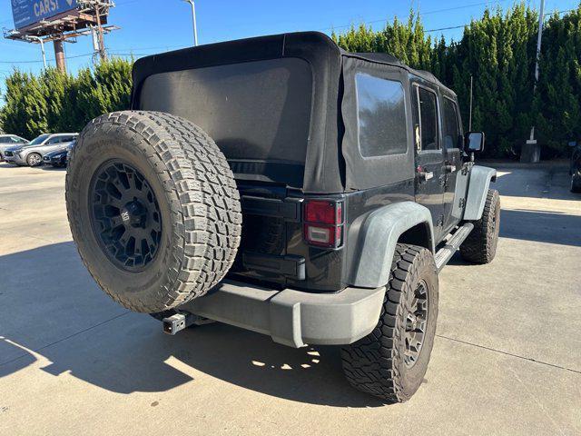 used 2014 Jeep Wrangler Unlimited car, priced at $16,999