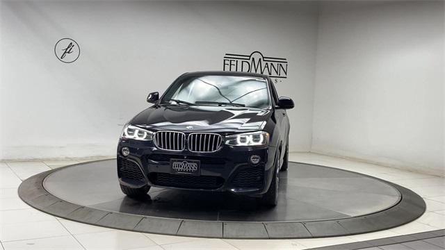 used 2015 BMW X4 car, priced at $14,688