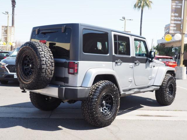 used 2015 Jeep Wrangler Unlimited car, priced at $21,627