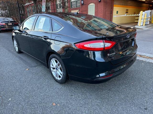 used 2014 Ford Fusion car, priced at $6,981