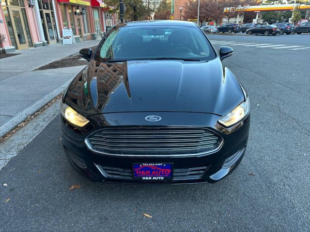 used 2014 Ford Fusion car, priced at $6,981