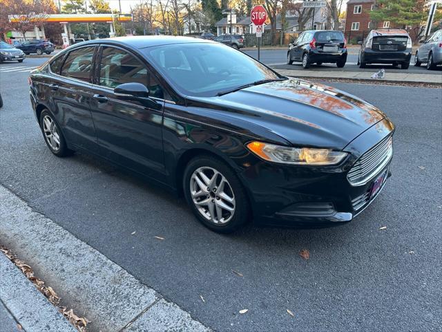 used 2014 Ford Fusion car, priced at $6,981