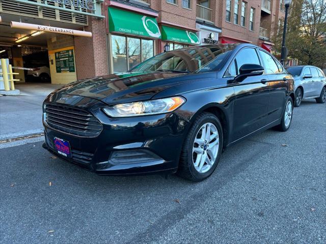 used 2014 Ford Fusion car, priced at $6,981