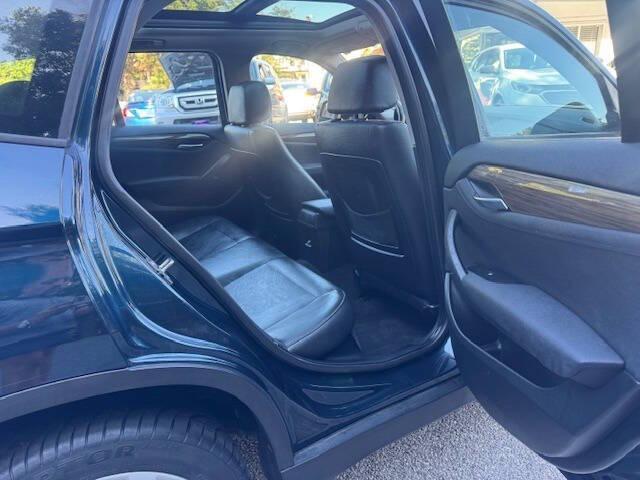 used 2014 BMW X1 car, priced at $5,481