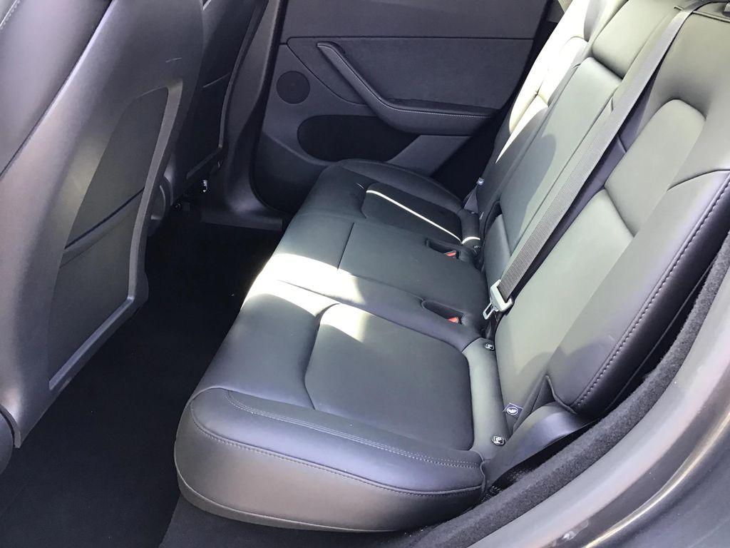 used 2025 Tesla Model Y car, priced at $31,995