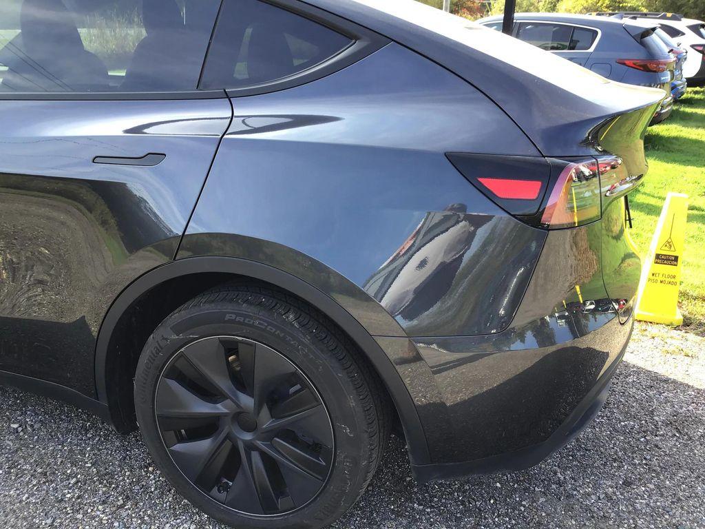 used 2025 Tesla Model Y car, priced at $31,995