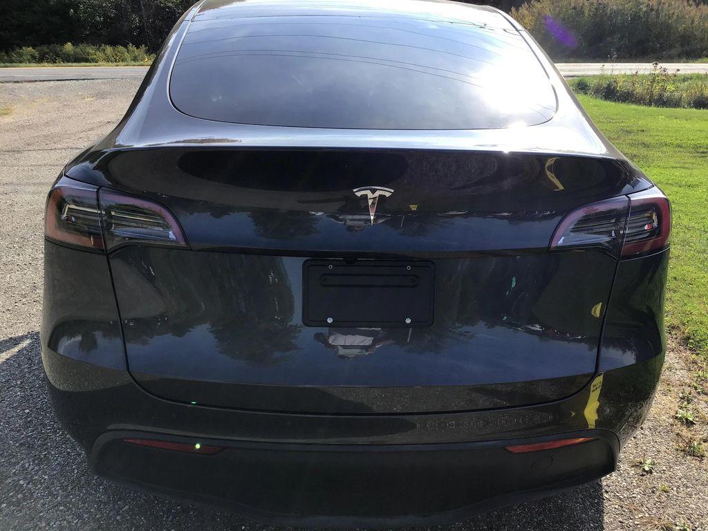used 2025 Tesla Model Y car, priced at $31,995