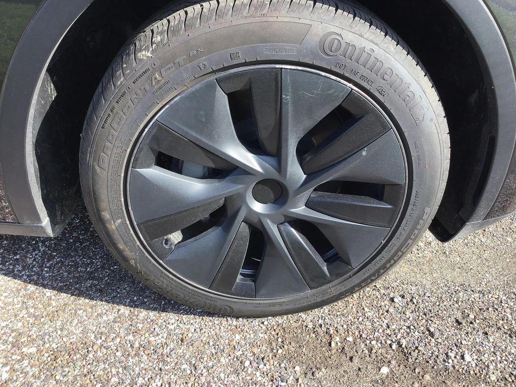 used 2025 Tesla Model Y car, priced at $31,995