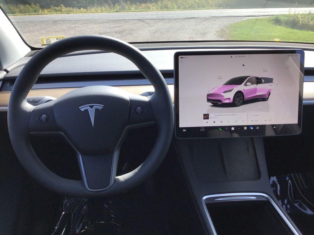 used 2025 Tesla Model Y car, priced at $31,995