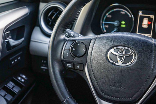 used 2018 Toyota RAV4 Hybrid car, priced at $26,995