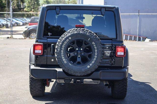 used 2021 Jeep Wrangler Unlimited car, priced at $34,380