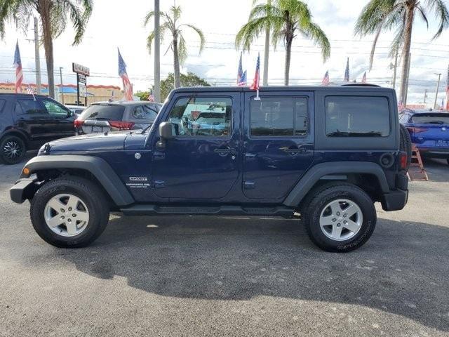 used 2013 Jeep Wrangler Unlimited car, priced at $18,995