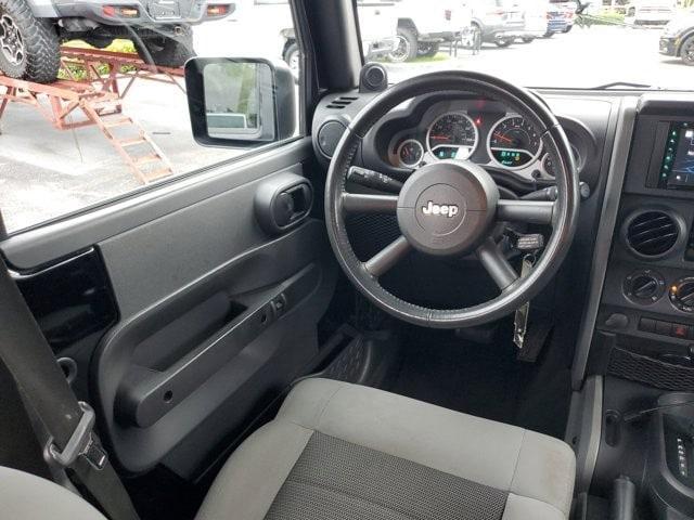 used 2010 Jeep Wrangler Unlimited car, priced at $12,995