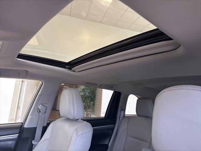 used 2019 Toyota Highlander Hybrid car, priced at $33,087