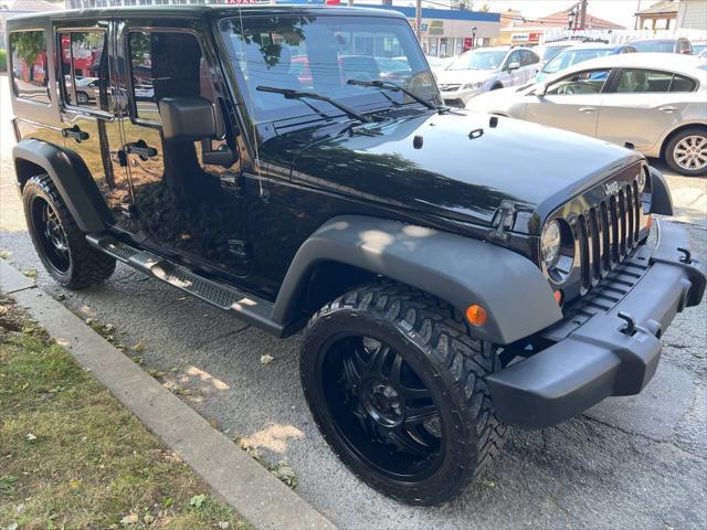 used 2011 Jeep Wrangler Unlimited car, priced at $8,999